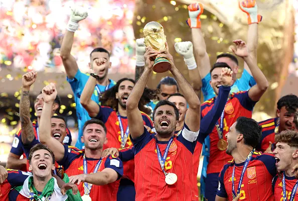 Spain players lift World Cup trophy